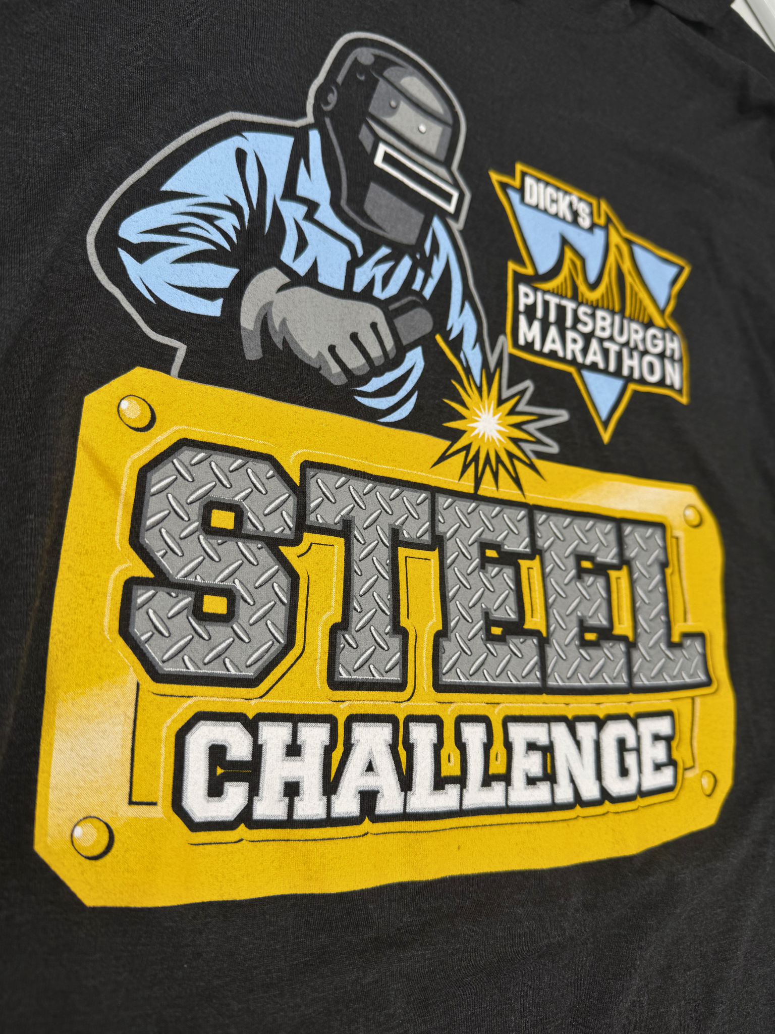 THE STEEL CHALLENGE LONGSLEEVE HOODED SHIRT